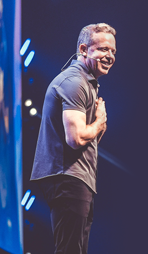 Image of Dr Joe with his hands over his heart.